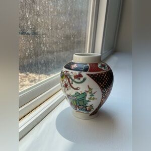 Colorful Ceramic Vase with Floral and Cart Design